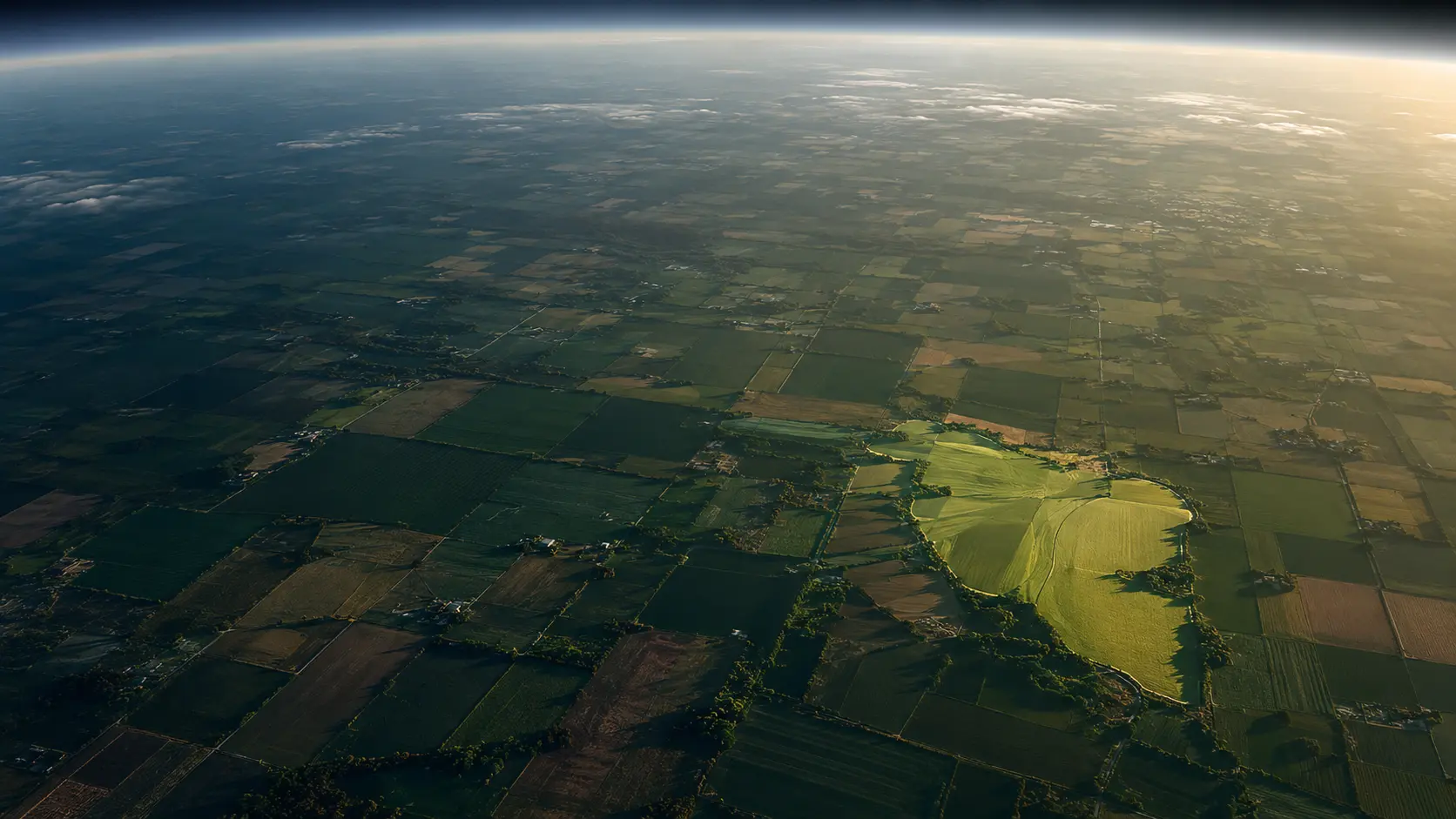 Agricultural fields viewed from the edge of the atmosphere